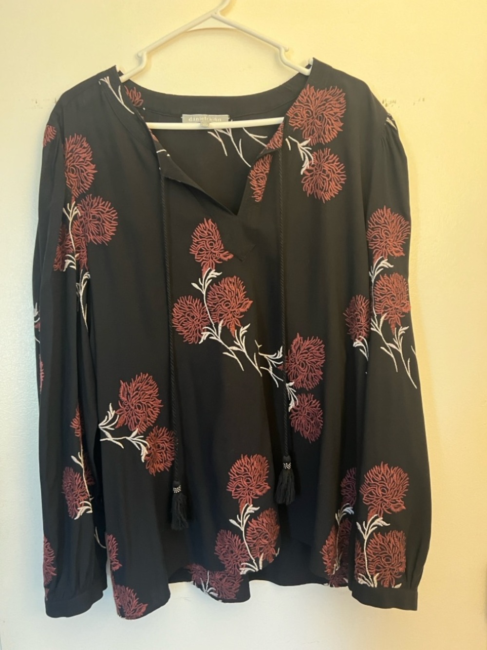 [Daniel Rainn| Stitch Fix
Francesca Floral Embroidered
Rayon Tassel V-Neck Top